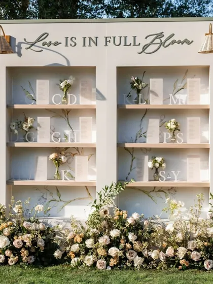 We believe love is in the details. This elegant seating chart, set against a backdrop of soft florals, was designed for a garden celebration, ensuring every element, no matter how small, felt personal and beautifully integrated into the event's story.