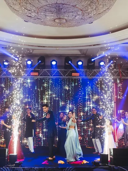 A full-family performance with pyrotechnics lighting up the stage. These big group numbers are always a highlight.
