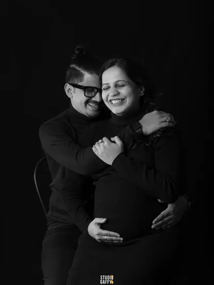 A loving embrace from behind, this monochrome shot is full of warmth and intimacy.