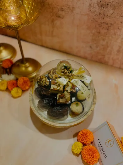 The glass cloche keeps the sweets fresh and doubles as a beautiful keepsake for your home.