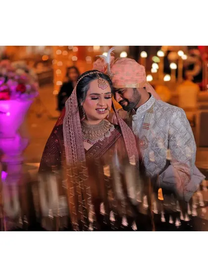 A creative, motion-blur shot of the couple, adding an artistic touch to their wedding photos.