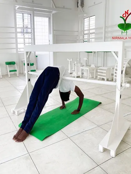 This is a perfect example of yoga with props. Using this trestle allows for a deep stretch in Adho Mukha Svanasana (Downward-Facing Dog), improving posture and flexibility with comfort and ease.