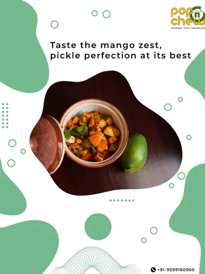 A closer look at the texture and colour of our mango pickle. Each piece of raw mango is perfectly preserved in a symphony of spices, a culinary masterpiece that connects generations.