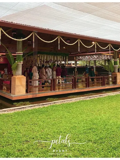 A wide view of a traditional venue, with the decor enhancing the beautiful architecture.
