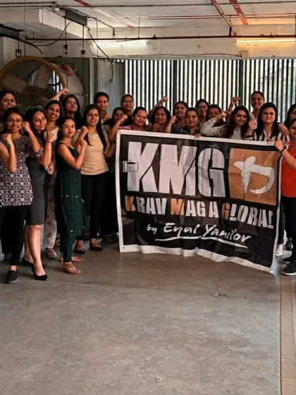 Holding our KMG banner high after an impactful women's self-defense workshop for a global logistics provider. We are committed to bringing safety training to women across all industries.