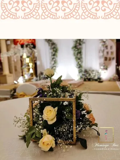 Another shot of the beautiful, understated floral centerpiece on a guest table.