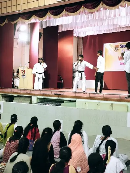 Here I am with my colleague Manikandan Master, showing a simple escape technique. We break down every move step by step during our on-stage demonstrations.