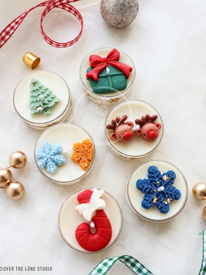 An assortment of my Christmas tealights, featuring reindeer, gifts, candy canes, and snowflakes. They look so festive all together.