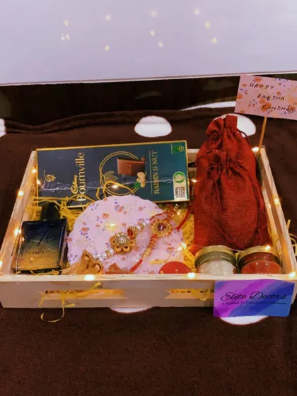 A full view of the classic Rakhi hamper for a brother, complete with a handwritten note. Every detail is arranged to create a warm and heartfelt gift.