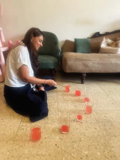 A peek behind the scenes of our curriculum planning. Here, one of our founders experiments with a 'jal tarang' (musical water glasses), exploring how to create simple, sound-based lesson plans for our classes.