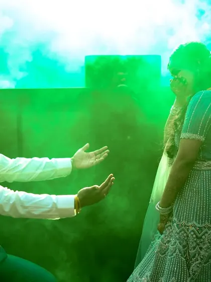 A dramatic shot using green smoke for a colorful and exciting dance floor moment.
