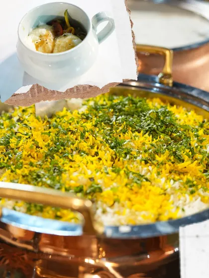 A sneak peek from our camera roll, featuring a large pot of aromatic vegetable Biryani, garnished with fresh herbs.