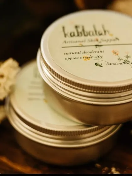 Stacked tins of my natural deodorant. These are easy to travel with and are completely plastic-free.