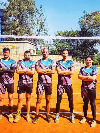 A team photo on the clay court at SAI. Whether on indoor or outdoor courts, the obsession with volleyball and the commitment to the team remain the same.