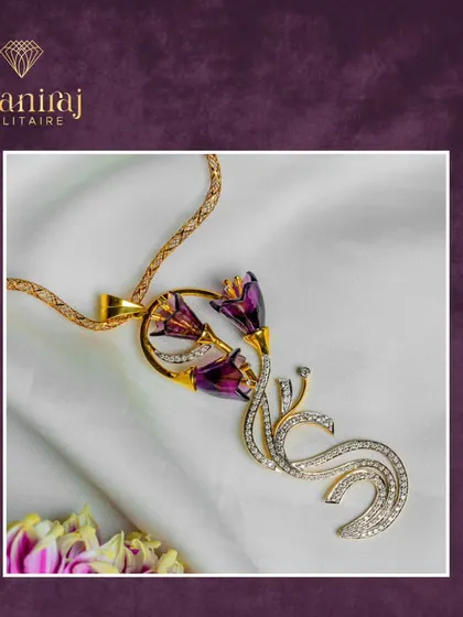 This pendant is a celebration of color and form. It features beautiful purple flower-like stones set in a swirling gold and diamond design. It's a piece of wearable art, perfect for life's special milestones.