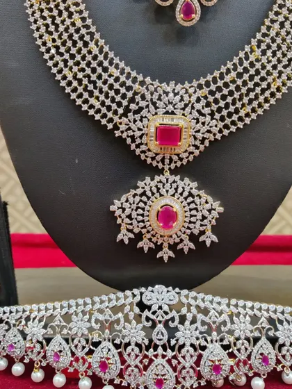 A close-up of the pendant and choker from the ruby and diamond-look set.