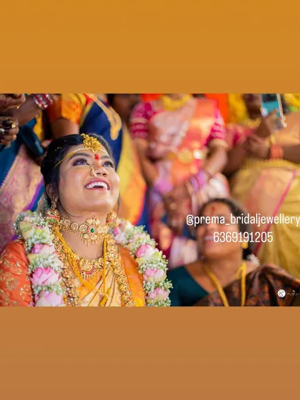 A joyful, candid shot of the bride looking up, capturing the happiness of the moment.