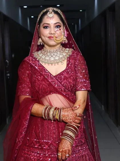 The complete look of our magenta sequin rental lehenga. It offers a modern, shimmering alternative to traditional bridal wear, ensuring you stand out.