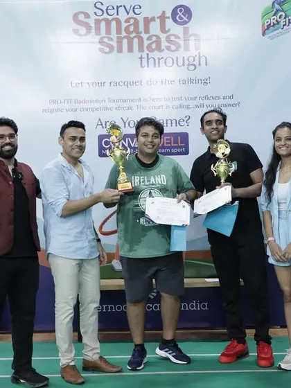 It's a great feeling to award the champions. Here I am with some of the winners from the Pernod Ricard India event. I am present on the ground to manage the flow, keep the energy high, and celebrate every participant's effort.
