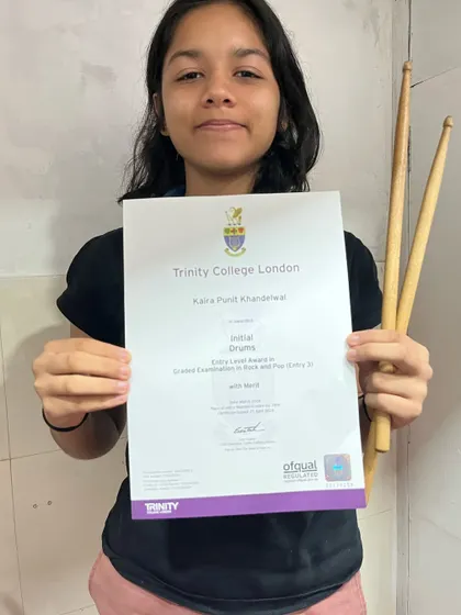 Congratulations to our own Kaira for her success in the Trinity Initial Drums exam, which she passed with Merit. Keep up the great work.