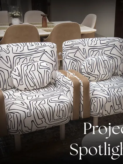 In this project, we embraced an abstract theme by combining varied textures and materials. The armchair, upholstered in a bold black-and-white abstract fabric, serves as a playful yet elegant focal point in this sophisticated living room.