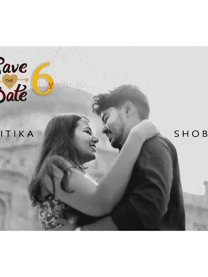 A classic "Save the Date" photo. This black and white shot captures an intimate moment between the couple, with a historical monument in the background, making it a perfect announcement for their upcoming wedding.