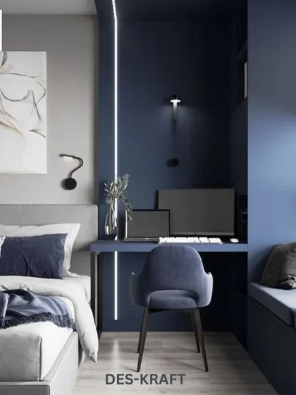 We integrated a functional workspace into this bedroom, using the same deep blue to create a cohesive and immersive environment for both rest and productivity.