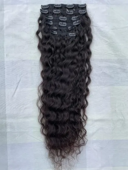 More curls, more bounce, more you. This is a full set of my curly clip-in extensions, designed to add incredible volume and life to your hair.