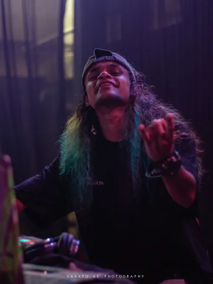 A moment of pure enjoyment on stage, feeling the vibe of the music.