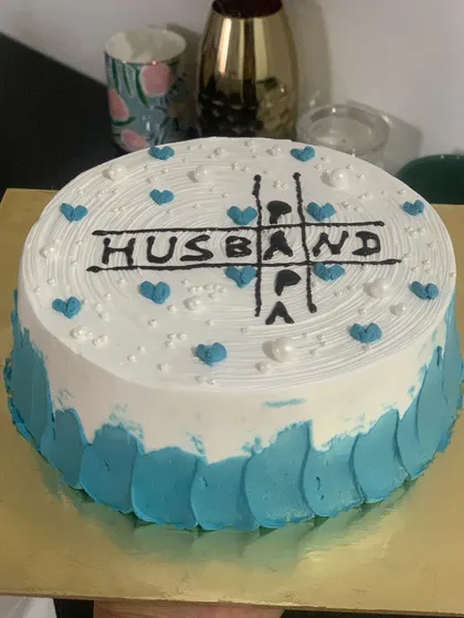 Another version of the popular "Husband" and "Dad" cake. This one uses a blue and white color scheme with little blue hearts.
