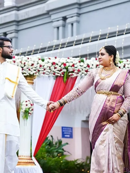 The couple holding hands, ready to start their new journey together.