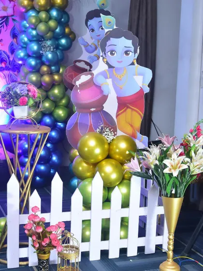 Custom cutouts of Lord Krishna for the party decor.