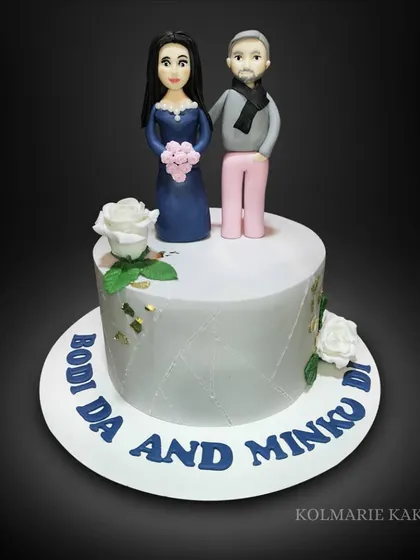 A last minute Tiramisu cake for a fellow Rotarian's wedding anniversary. I created custom fondant toppers of "Bodi da and Minku di" to make it extra personal.