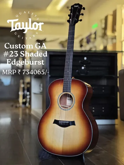 The Taylor Custom GA #23 in a Shaded Edgeburst finish. This custom Grand Auditorium model showcases Taylor's exceptional craftsmanship and attention to detail, delivering both stunning looks and sound.