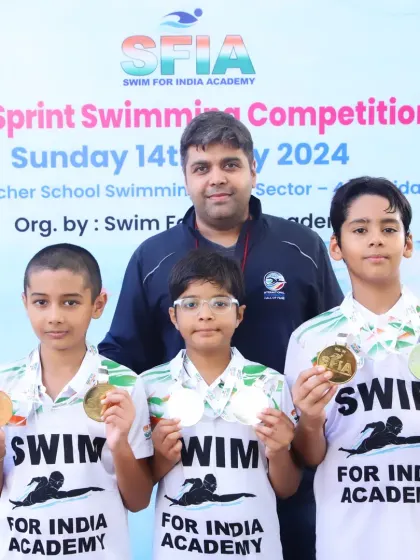 Posing with some of our talented young medalists. Seeing their pride and joy is the greatest reward of organizing these competitions.