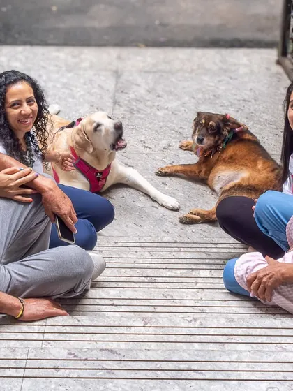 A full family portrait on the steps of their home. It was a special shoot to commemorate their time in a place filled with memories with their two beloved dogs.
