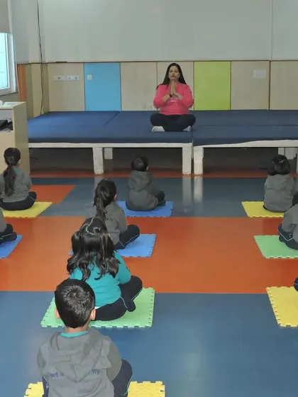 A small group of students practices mindfulness and meditation as part of our Device Detox Day activities.