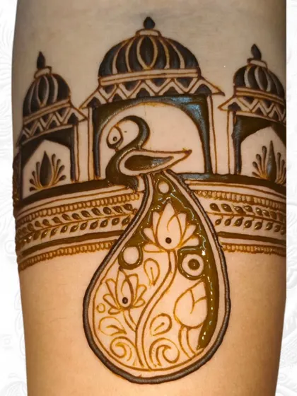 Another angle of the engagement arm band, highlighting the fine lines of the peacock and lotus design.