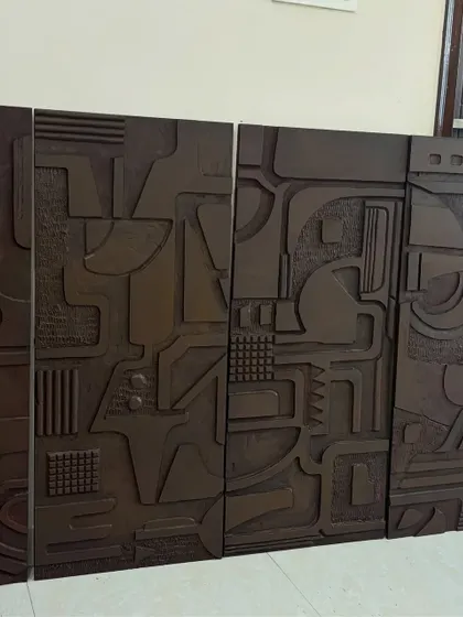 The four dark textured panels from the Jaipur project, seen here in my studio. This shows how the pieces are designed to align and create a continuous abstract narrative when installed together.