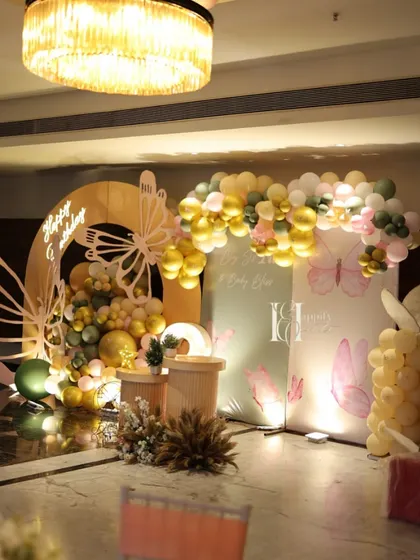 The full butterfly-themed setup, showing how different elements like backdrops, props, and lighting come together to create an enchanting atmosphere.