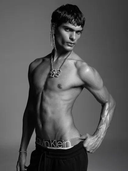 A black and white shot from a Calvin Klein campaign I directed. The goal was to capture a raw, powerful image that highlights both the model's physique and the brand's iconic underwear. This type of high-contrast, minimalist photography is a signature of my menswear work.