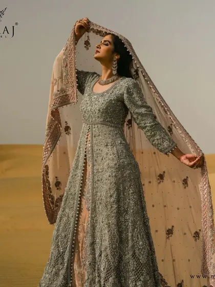A full view of the ravishing pastel Indo-Western attire, with its gorgeous georgette dupatta and heavy work.