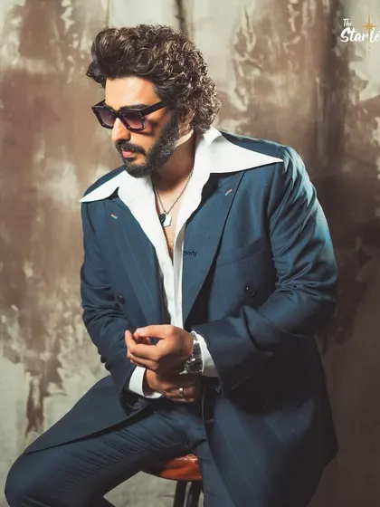 A feature in The Starlet where they highlighted my work with actors like Arjun Kapoor. This shot captures the retro-inspired suit I styled for him, showcasing the wide collar and tailored fit.