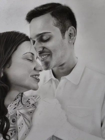 A progress shot of a couple portrait, showing the faces nearly complete.