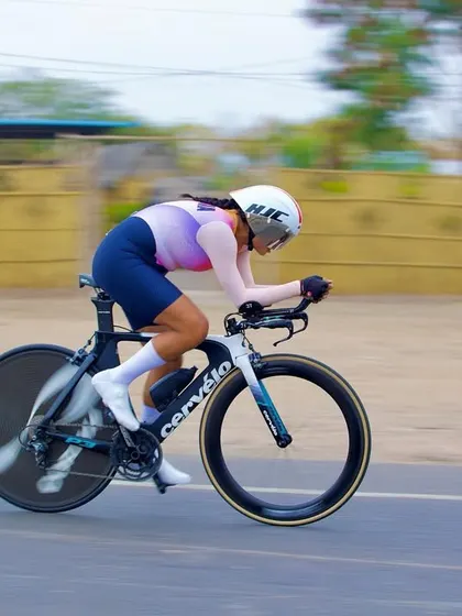 Holding a steady, aerodynamic position during a 30km Individual Time Trial (ITT). This is about pure power and endurance, a skill that is fundamental to a strong triathlon bike leg.