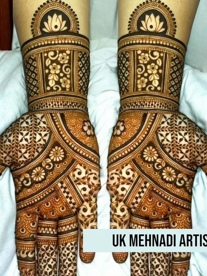 This is a beautiful example of a full-hand traditional design. The patterns are symmetrical and filled with fine details, perfect for festivals like Karwa Chauth.