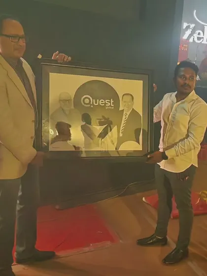 Presenting the artwork at a company event.