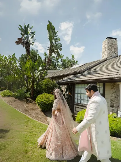 The first walk as husband and wife. This photojournalistic shot captures the beginning of a new chapter at their intimate home wedding.