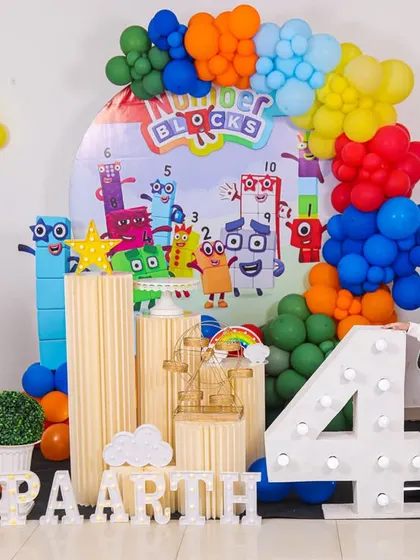A charming 'Farm' themed birthday party, with rustic decor, animal cutouts, and hay bale props, perfect for a country-style celebration.