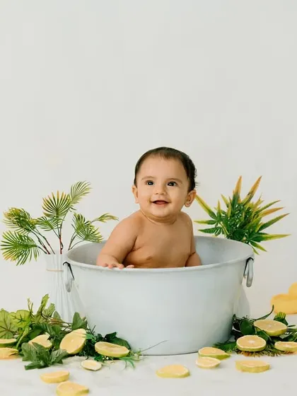 A splash of citrusy fun! This lemon-themed bath time shoot is fresh, vibrant, and full of smiles.